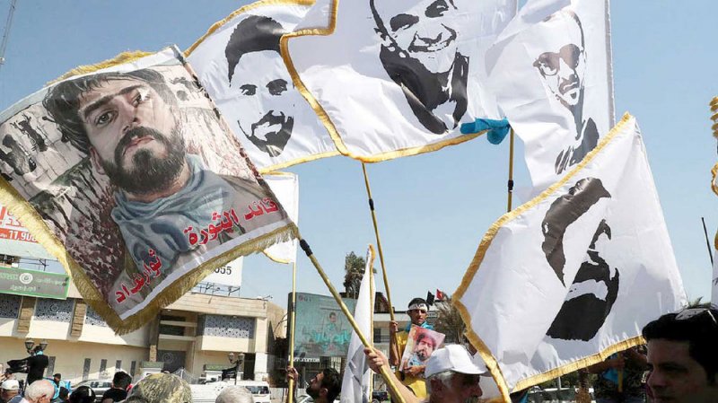 تظاهرة حاشدة في بغداد.. وصور لناشطين مغدورين