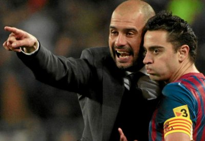 غوارديولا: تشافي "مهيأ" لتدريب برشلونة
