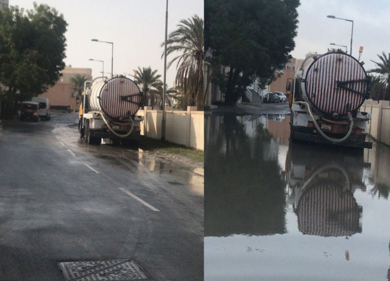 بالصور: جهود فريق "طوارئ الأمطار" في سحب المياه