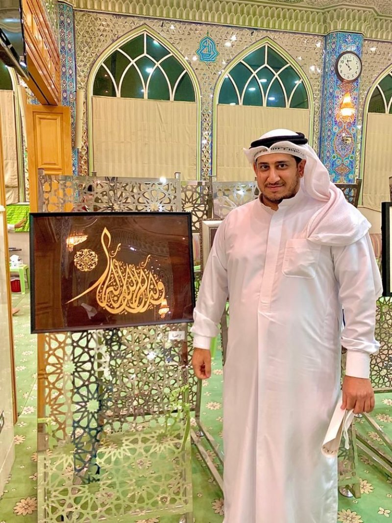 الزميل الخطاط على جمعة يفوز بالمركز الأول بمسابقة الذكر الحكيم