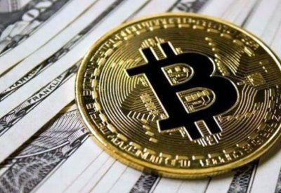 عملة بيتكوين المشفرة تتراجع إلى 27464 دولار