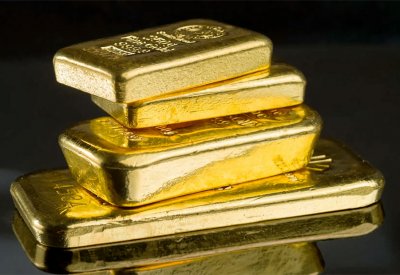 صعود الدولار يهبط بالذهب من أعلى مستوى في 6 أشهر