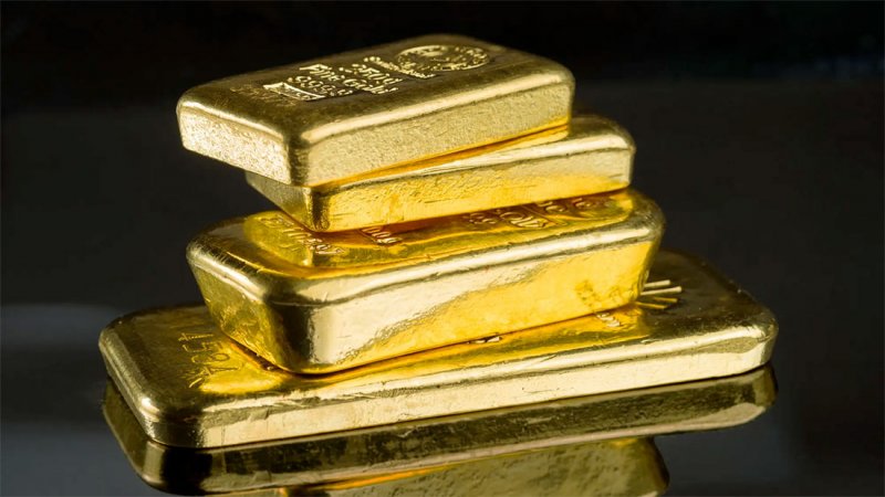 صعود الدولار يهبط بالذهب من أعلى مستوى في 6 أشهر