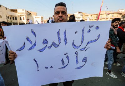 ما الأسباب الحقيقية لأزمة الدينار العراقي؟