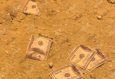 3 آلاف دولار ممزقة على قارعة الطريق في الجفير