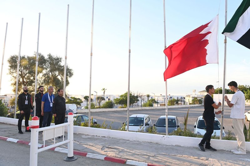إجراء مراسم رفع العلم بالقرية الرياضية