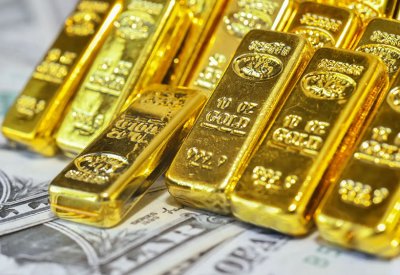 الذهب يلمع بدعم من تراجع الدولار بعد قرار الفيدرالي