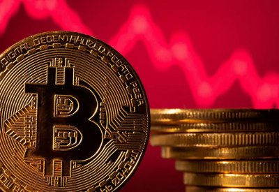 بتكوين تهبط لأقل من 58 ألف دولار وسط ترقب لاجتماع الفيدرالي