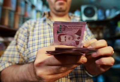 الليرة السورية ترتفع أمام الدولار الأميركي