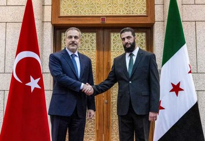 الجولاني وفيدان يتفقان على نزع سلاح الأكراد وحل الفصائل