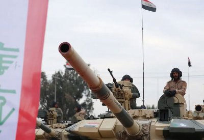 إصابة 9 من الأمن العراقي خلال اشتباكات مع فصيل مسلح في بغداد