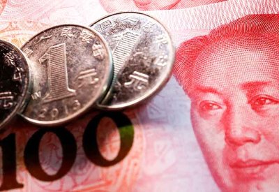 اليوان الصيني يتجاوز 7 مقابل الدولار لأول مرة منذ 2024
