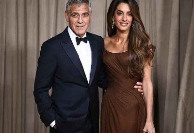 فرنسا تمنح جورج كلوني وأمل علم الدين وتوأميهما الجنسية