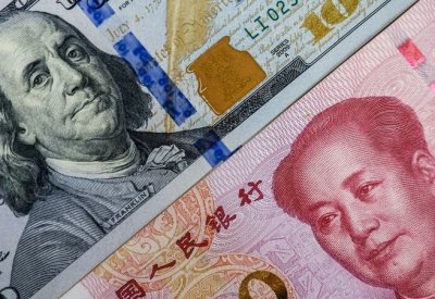 الدولار يرتفع أمام اليوان الصيني في تعاملات اليوم