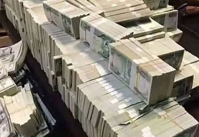 "جبال دولارات".. فيديو من منزل نائبة يفجر غضب العراقيين
