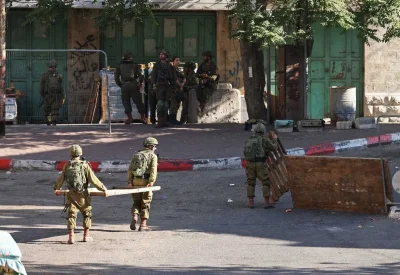 إسرائيل تعتقل 66 فلسطينيا في الضفة الغربية