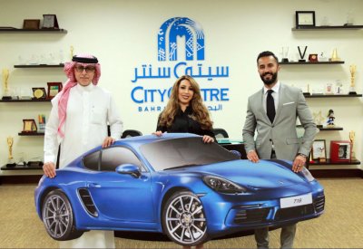 “السيتي سنتر” يعلن الفائز بسيارة بورش كايين 