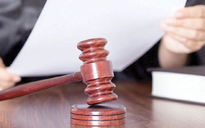 براءة شاب من ضرب وسرقة حقيبة آخر